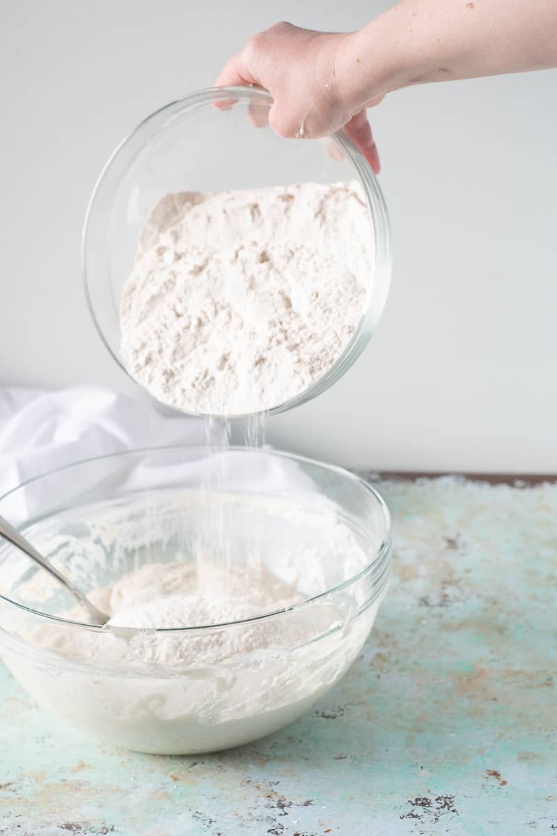 Adding flour to sponge