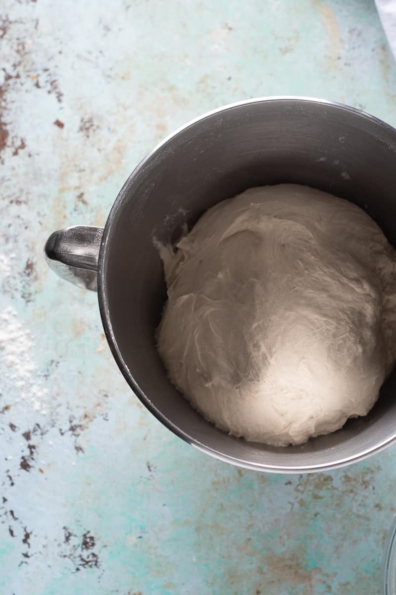 Bagel dough in a stand mixer bowl