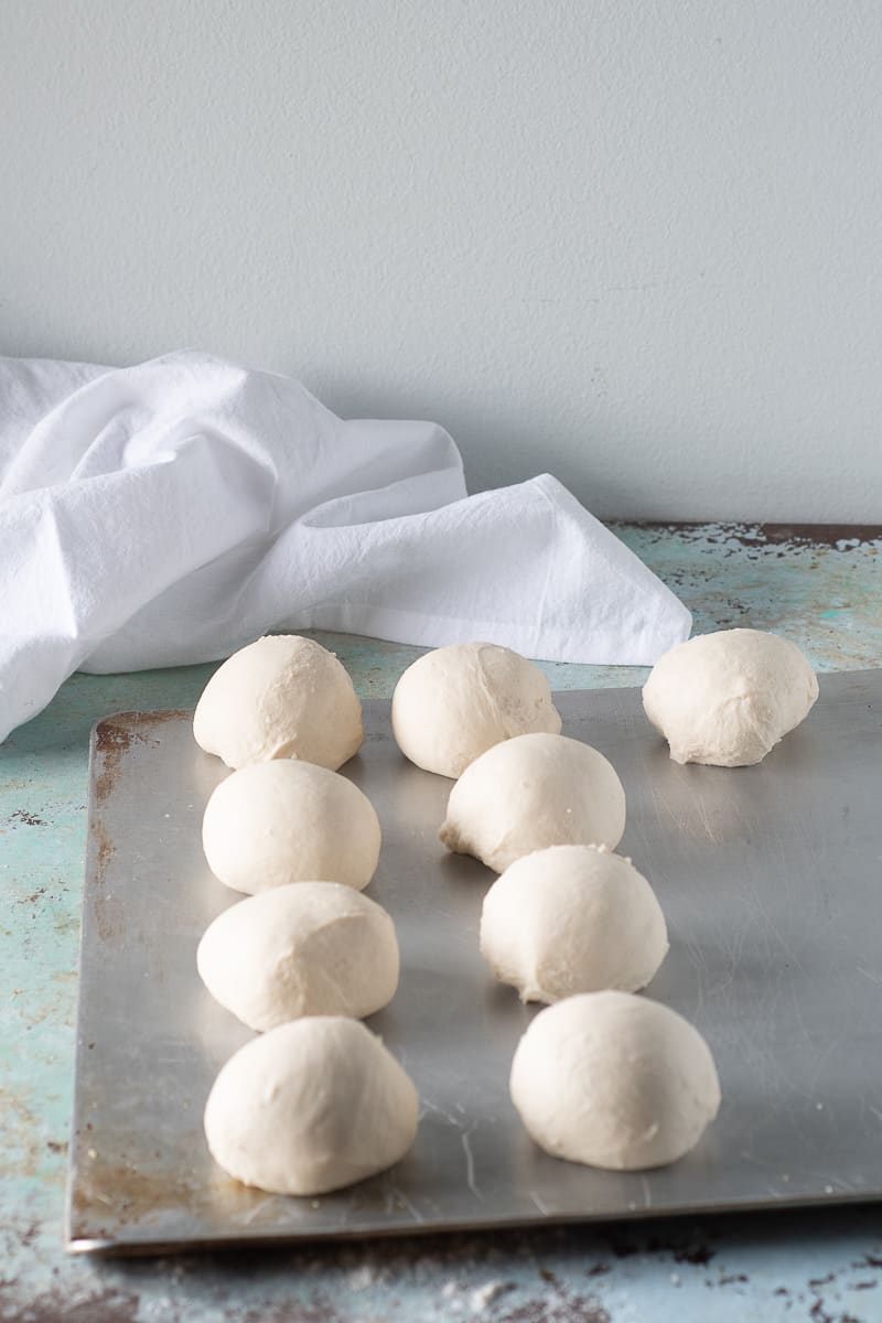 Dough balls waiting to be shaped into bagels