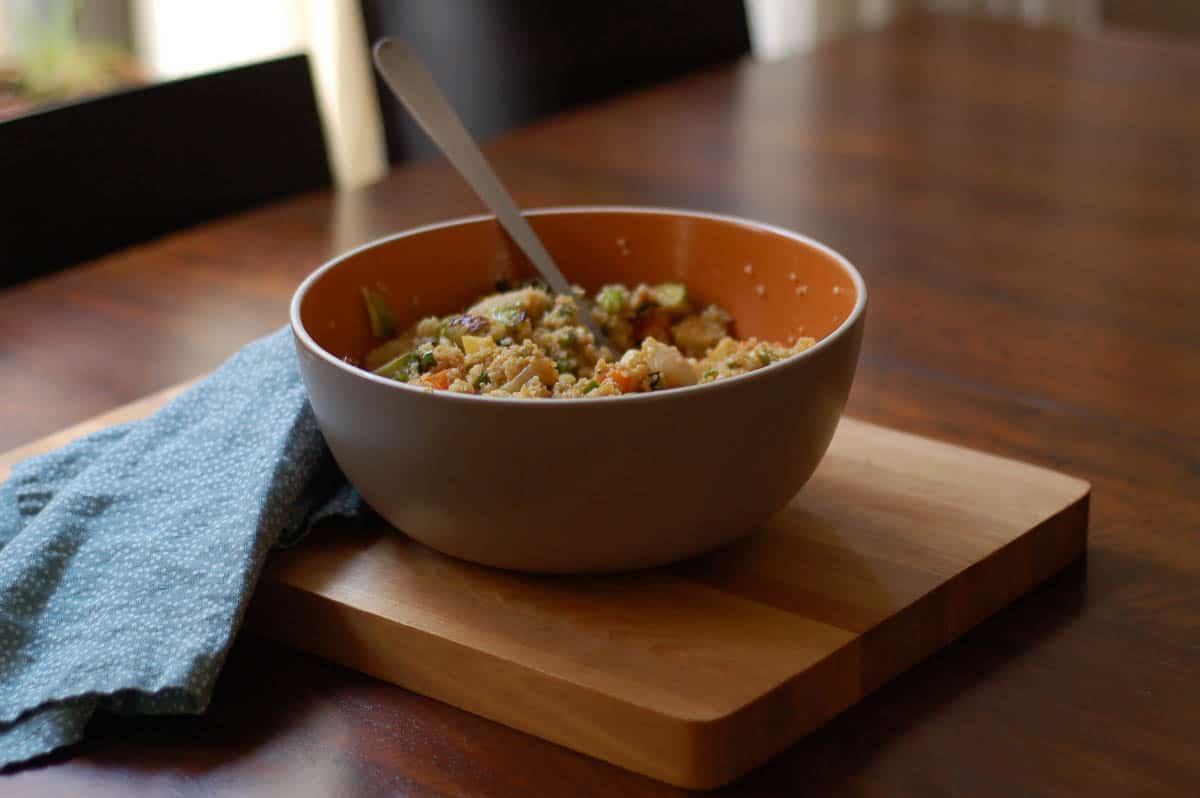Ginger Scallion Quinoa in a large bowl on a cutting board
