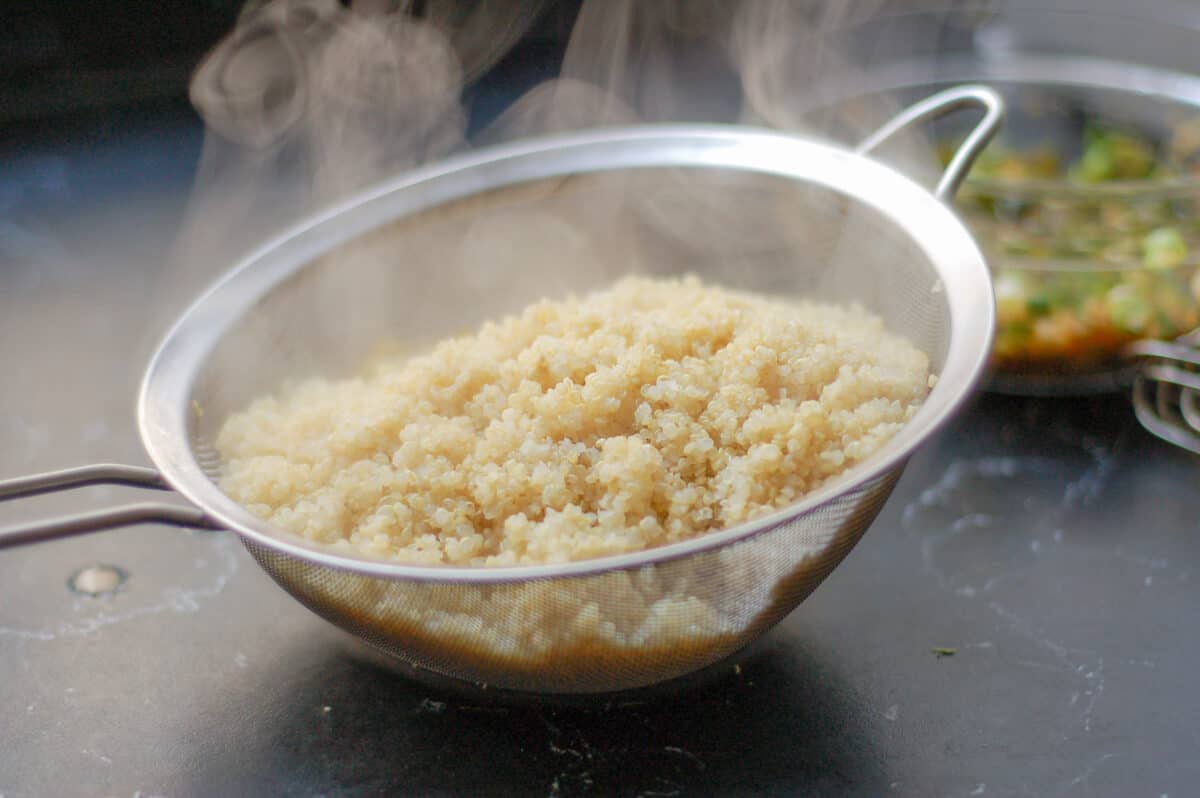 Steaming quinoa in a strainer