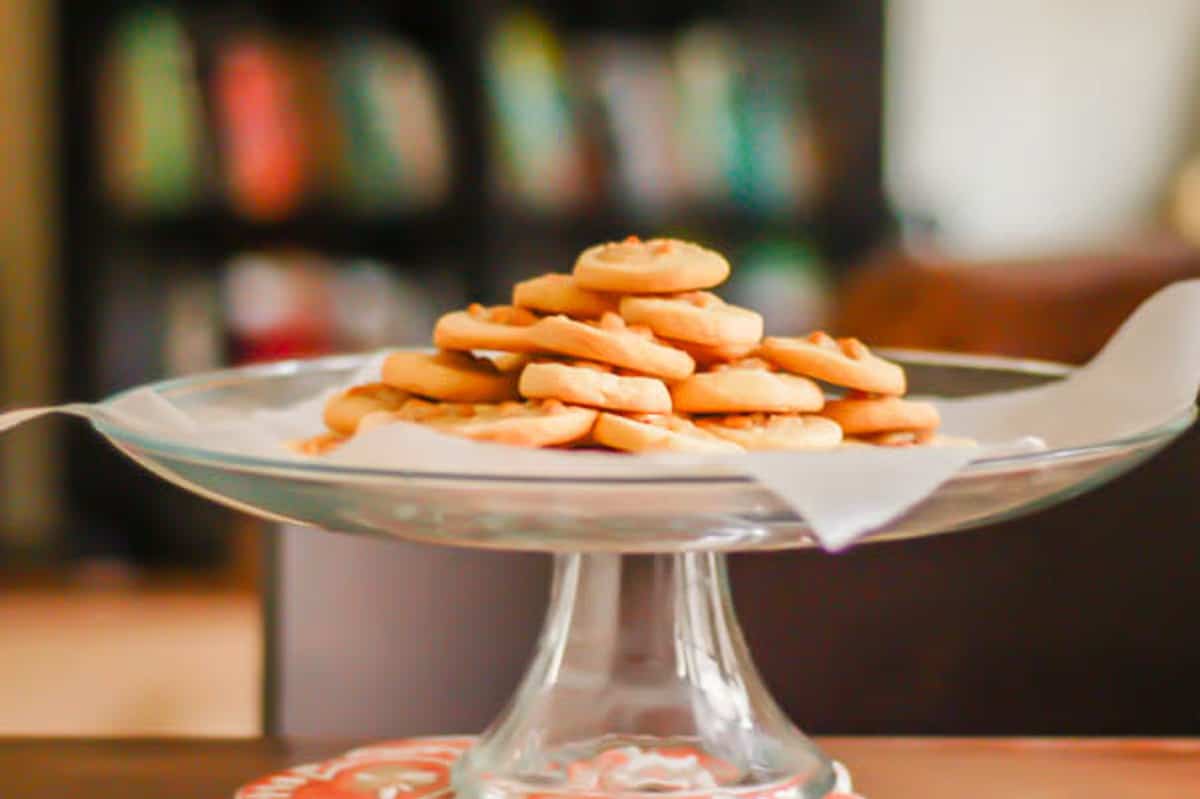 Rosemary Pine Nut Cookies on a cake stand