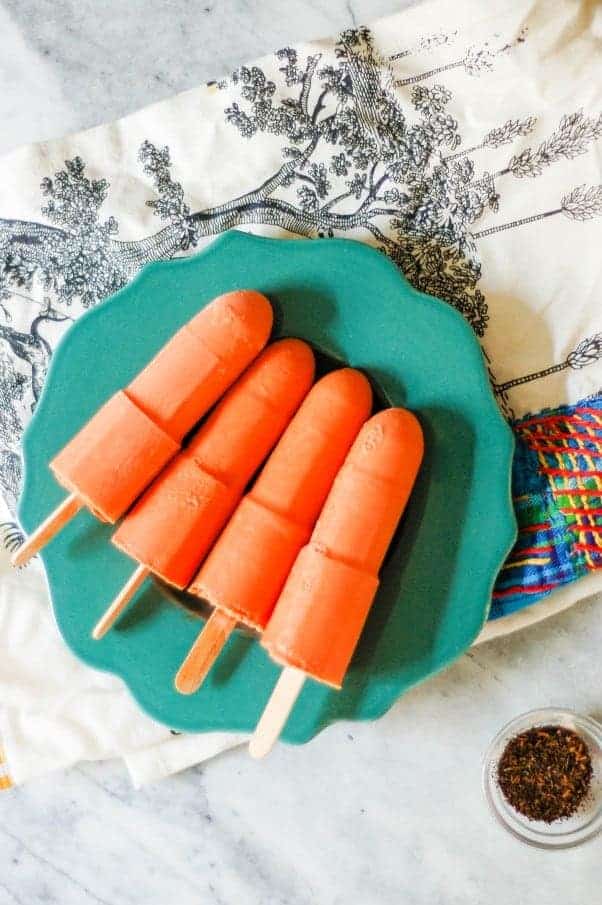 Thai Iced Tea Popsicles! Creamy black tea ice pops with a hint of vanilla and spice. From Blossom to Stem | Because Delicious www.blossomtostem.net #frozenfridays