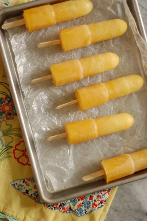 Pineapple Passion Fruit Popsicles. Bright, tropical, delightful! From Blossom to Stem | Because Delicious www.blossomtostem.net