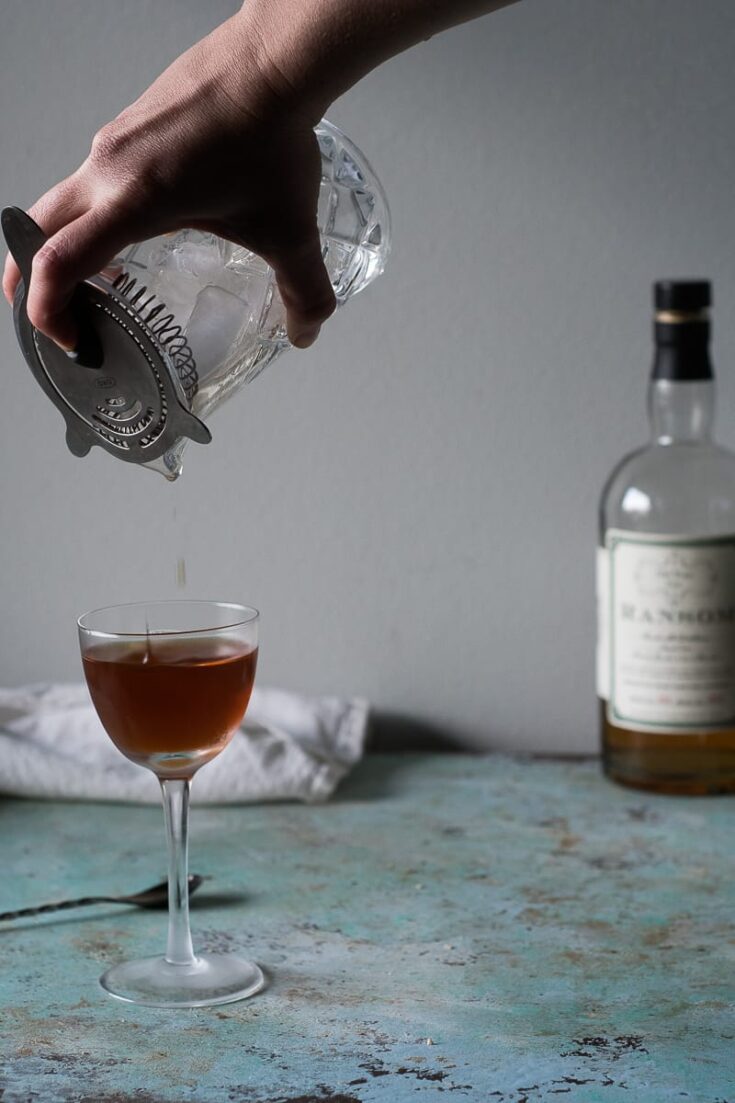 Pouring Martinez into chilled glass