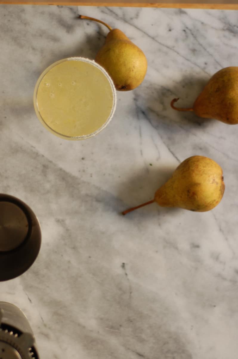 Overhead shot of pears and the perfect pear cocktail