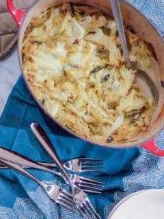 Savoy Cabbage Gratin in a red Dutch oven overhead view