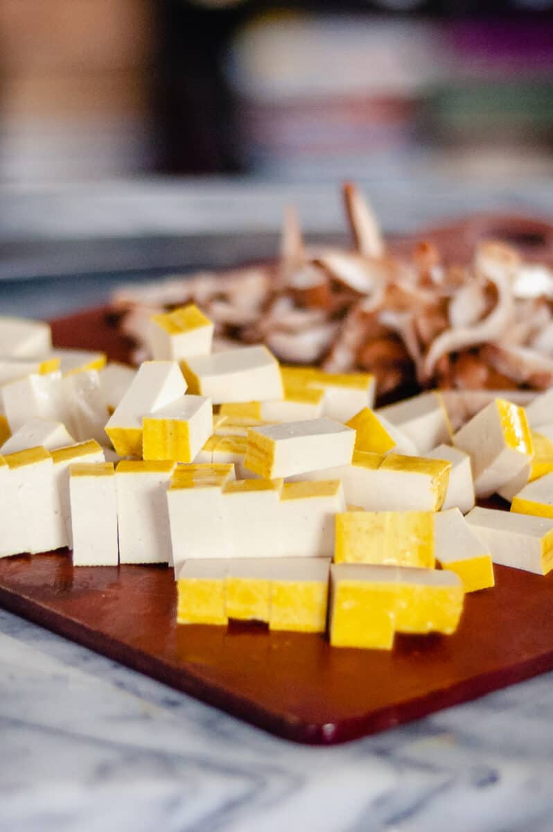 Cubed tofu on a cutting board