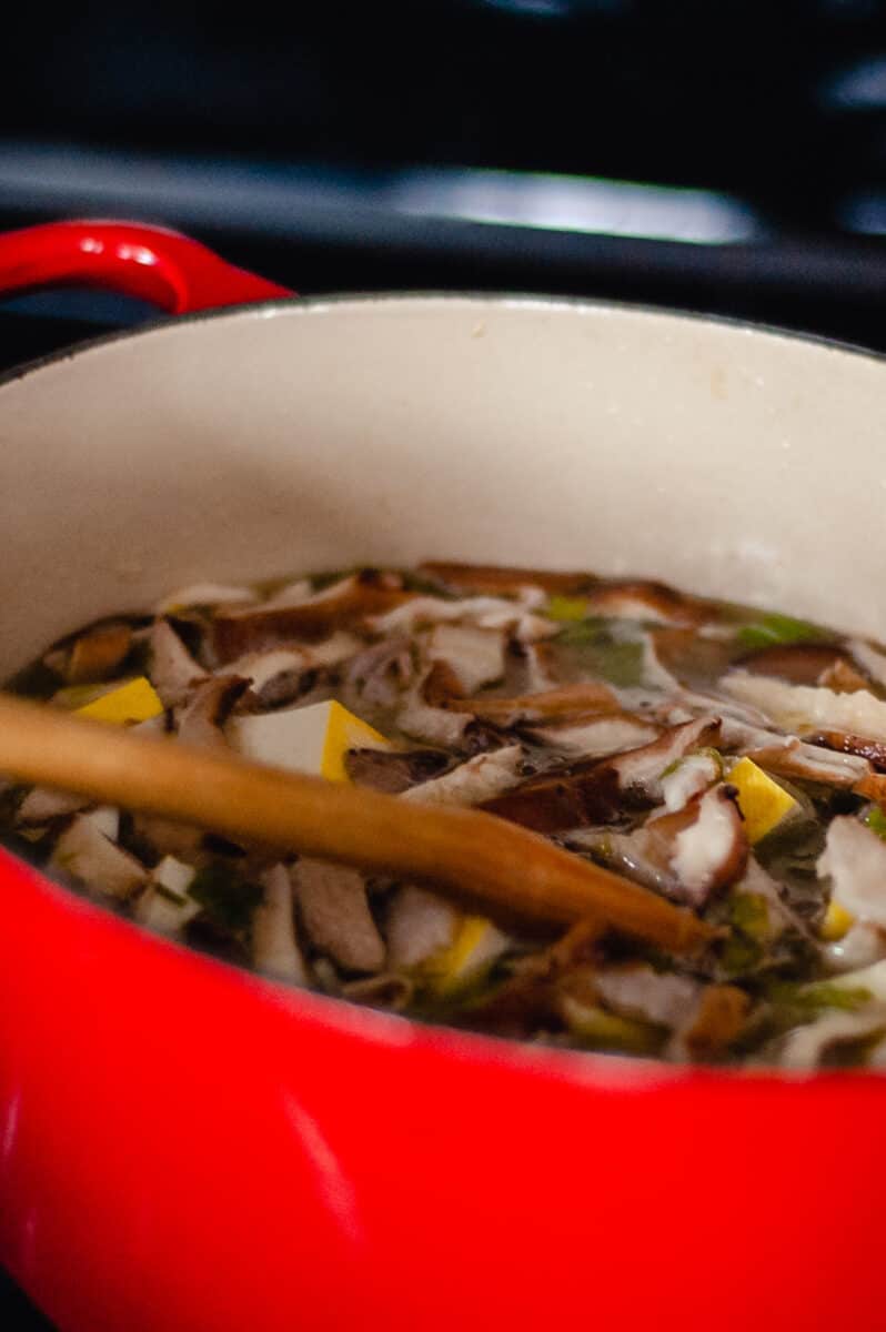 Hot and sour soup in a red Dutch oven