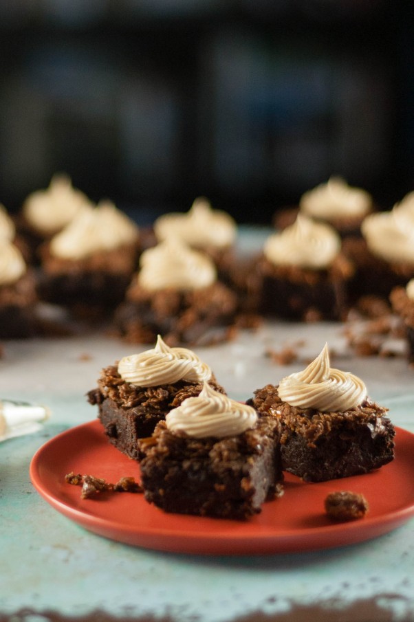 Salty Peanut Butter Crunch Brownies. Fudgy brownies with a crisp layer of chocolate-peanut-butter feuilletine topped with a swirl of salted peanut butter buttercream. Salty, sweet, crispy, creamy, delicious! From Blossom to Stem | Because Delicious www.blossomtostem.net