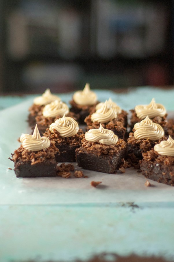 Peanut Butter Crunch Brownies. Fudgy brownies with a crisp layer of chocolate-peanut-butter feuilletine topped with a swirl of salted peanut butter buttercream. Salty, sweet, crispy, creamy, delicious! From Blossom to Stem | Because Delicious www.blossomtostem.net