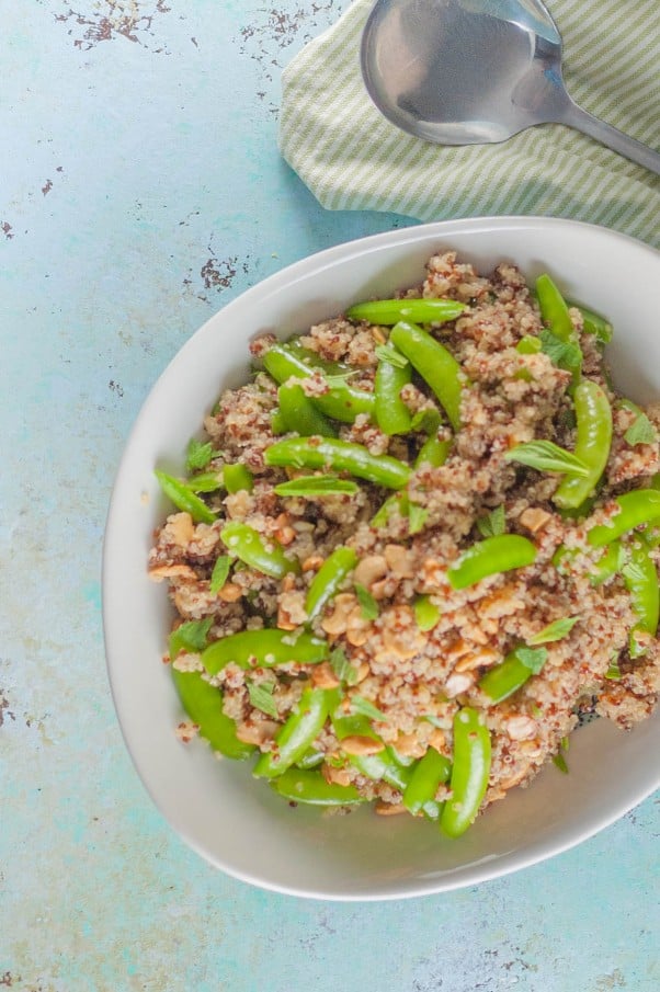 Sugar Snap Pea and Cashew Quinoa Bowl. A light summery grain salad with a Vietnamese-inspired fish sauce lime vinaigrette. From Blossom to Stem | Because Delicious