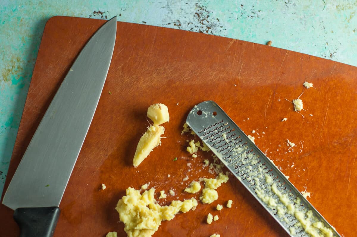 Grated ginger on a cutting board