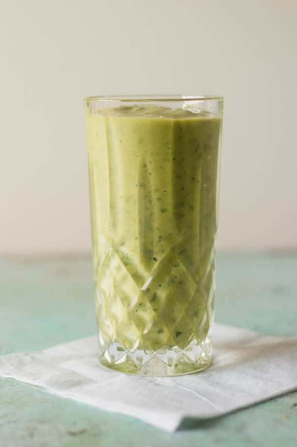 Pineapple Mango Ginger Green Smoothie. A bright green kale smoothie with tropical fruit, ginger, probiotics from kefir. A perfect way to start the day. From Blossom to Stem | Because Delicious | www.blossomtostem.net