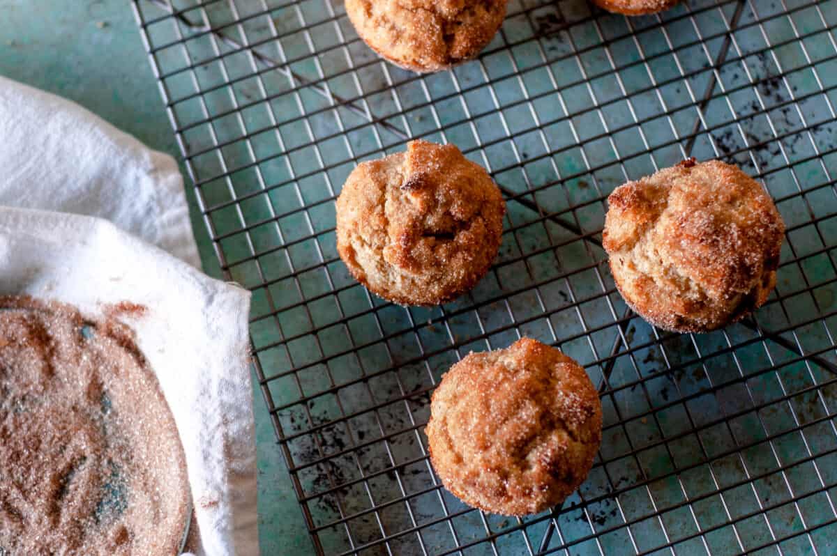 Cinnamon Sugar Oat Muffins on a cooling rack