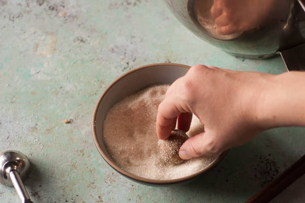 Rolling cookie dough in sugar