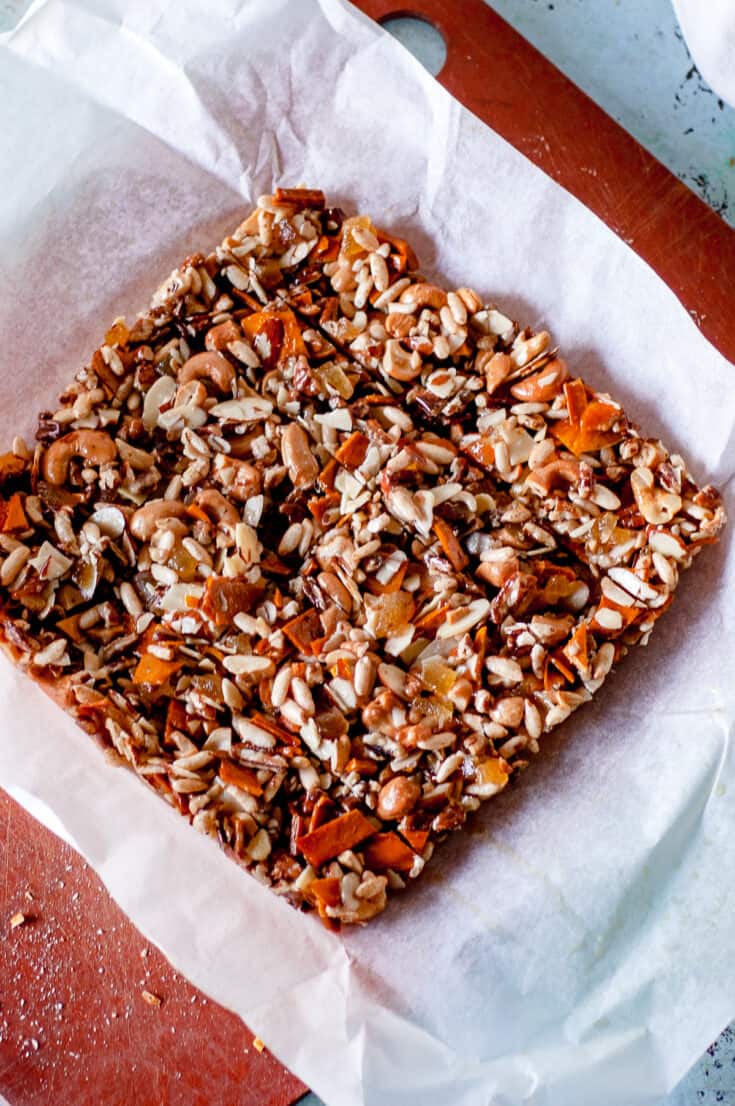 Homemade Kind bars, sliced on a piece of parchment paper