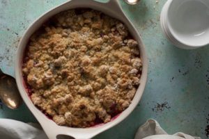 Rhubarb Crumble. Bright pink tart rhubarb tossed with sugar and orange zest slumped under a brown butter vanilla bean cookie-like lid. Rustic and homey baking at its best. From Blossom to Stem | Because Delicious | www.blossomtostem.net