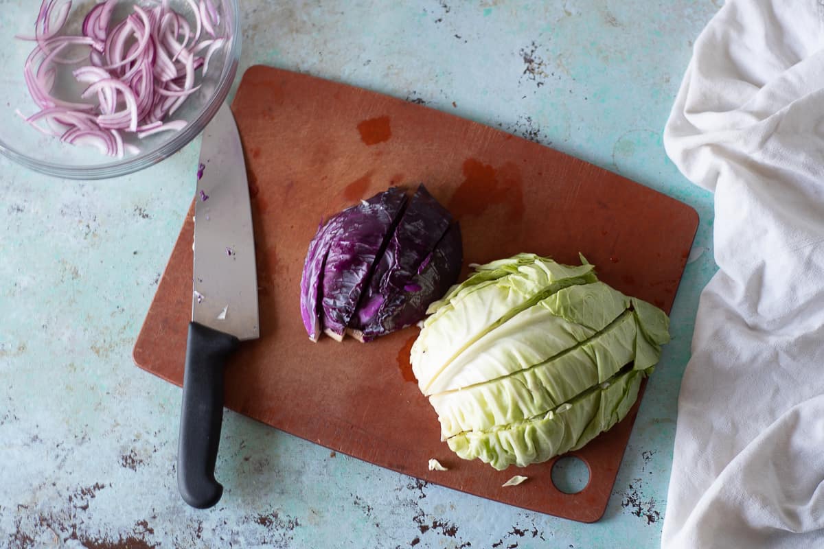 Red and green cabbage sliced into wedges