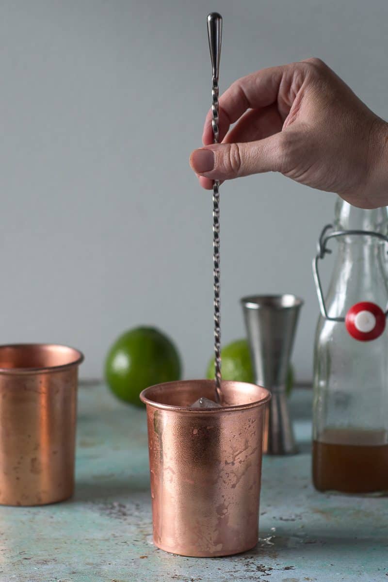 Stirring a mezcal mule