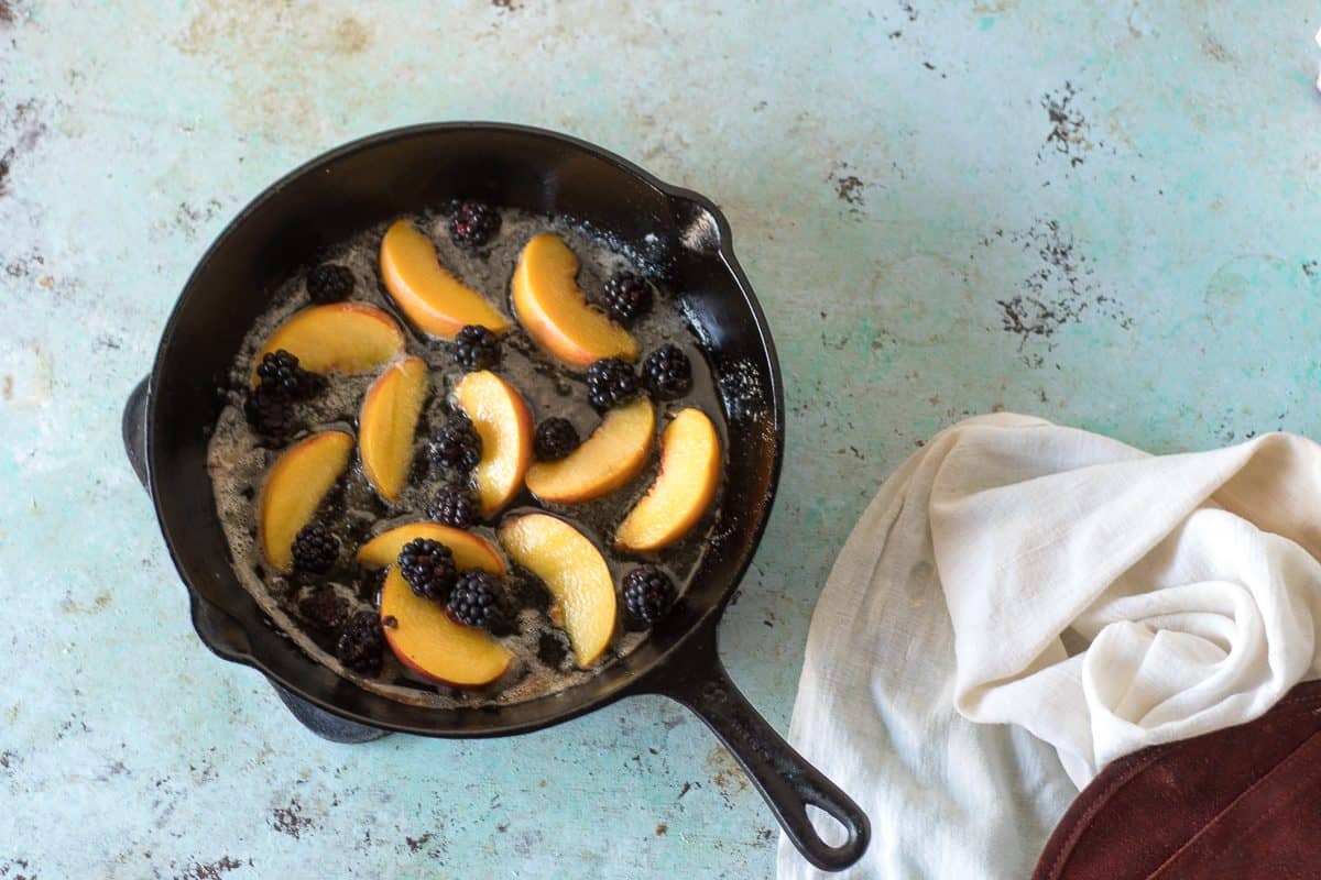 Blackberries and Peaches in a cast iron pan