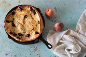 Blackberry Peach Dutch Baby. A puffy, golden oven pancake with berries and stone fruit. A simple sweet breakfast or brunch. From Blossom to Stem | Because Delicious | www.blossomtostem.net