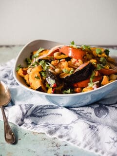 Chile-lime squash and chickpea salad in a blue bowl