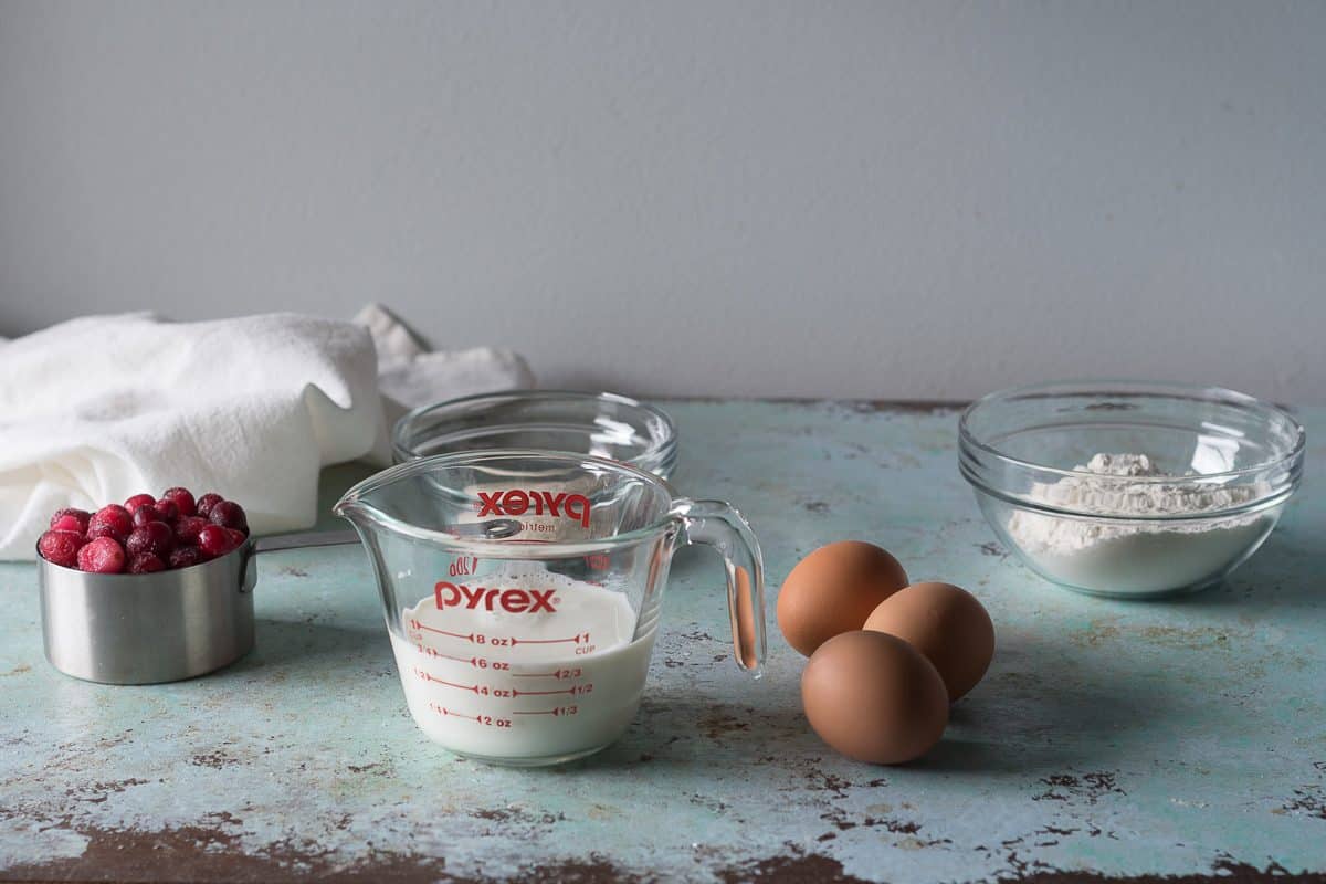 Cranberries, milk, eggs, and flour