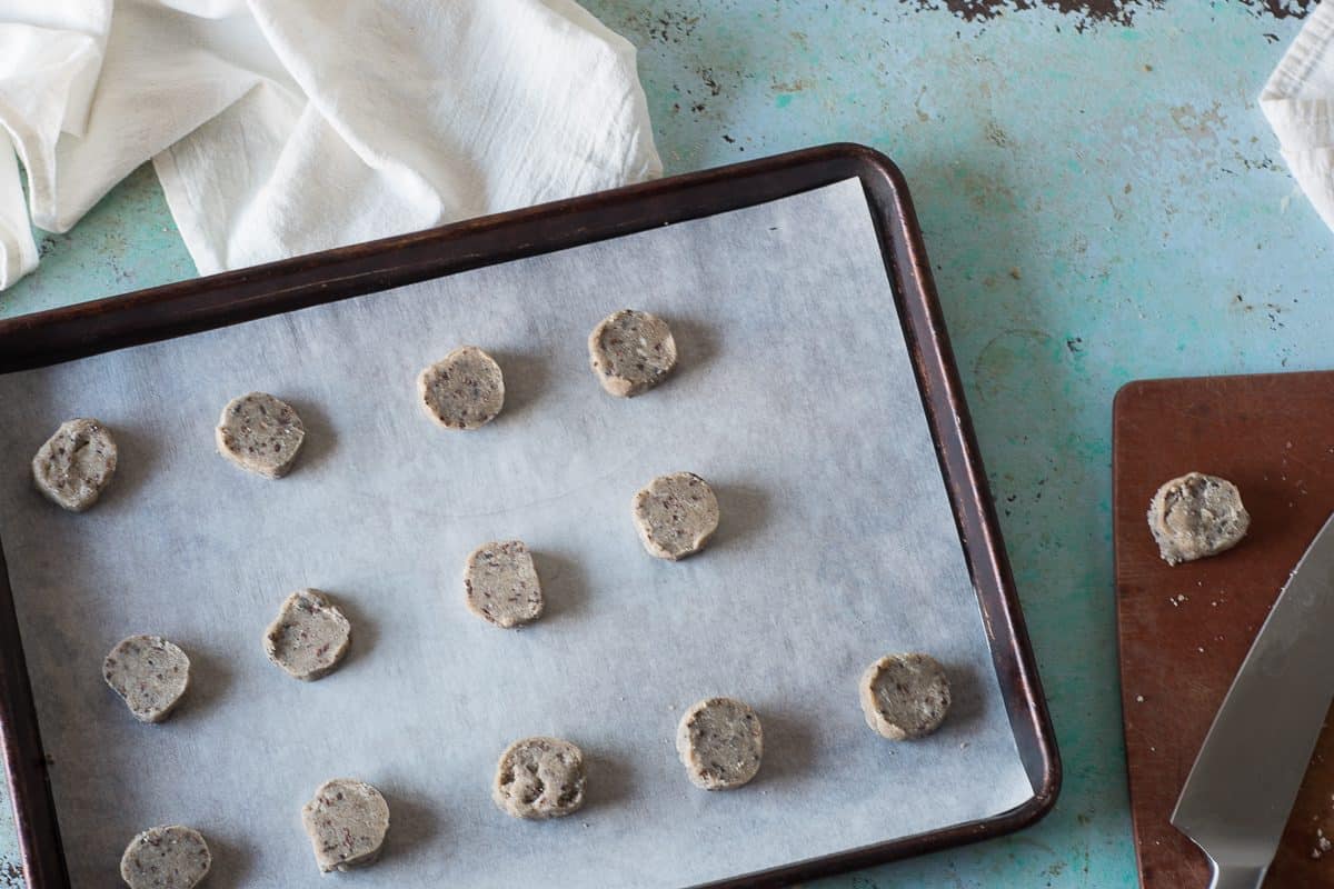 Unbaked Nibby Buckwheat Cookies on a baking sheet