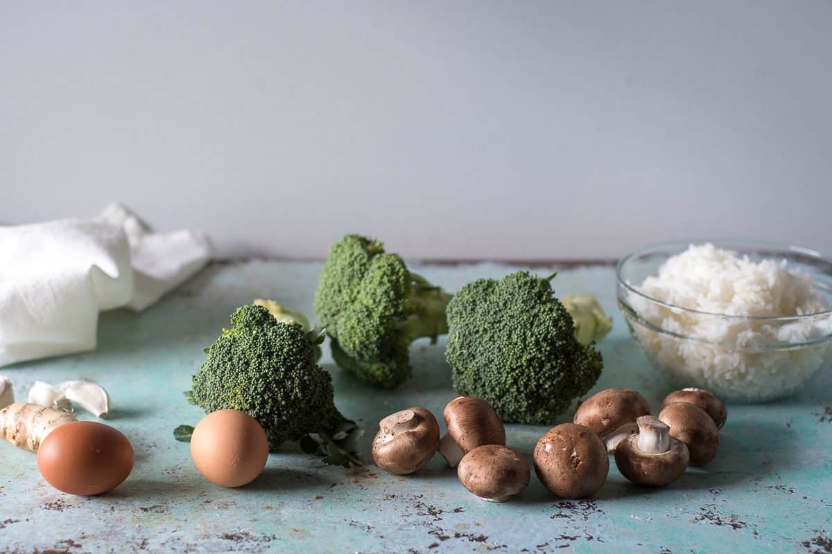Ginger root, eggs, broccoli, mushrooms, and cooked rice