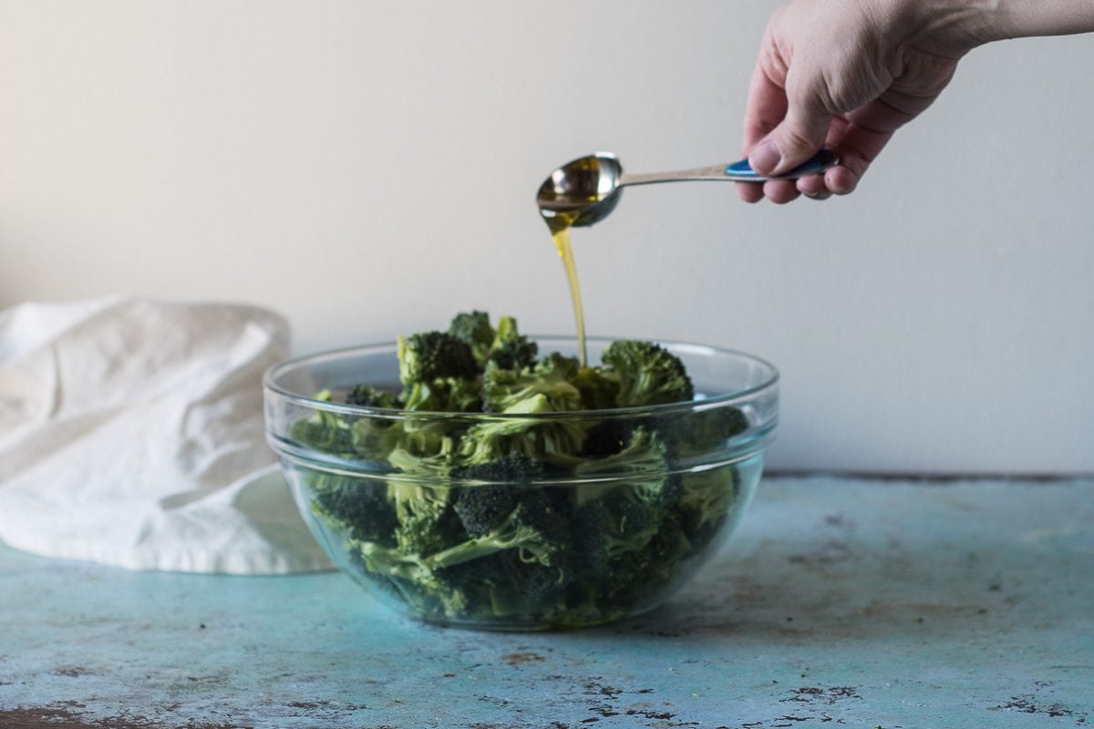 Charred Broccoli with Harissa Yogurt Sauce and Nigella Seeds. From Blossom to Stem | www.blossomtostem.net