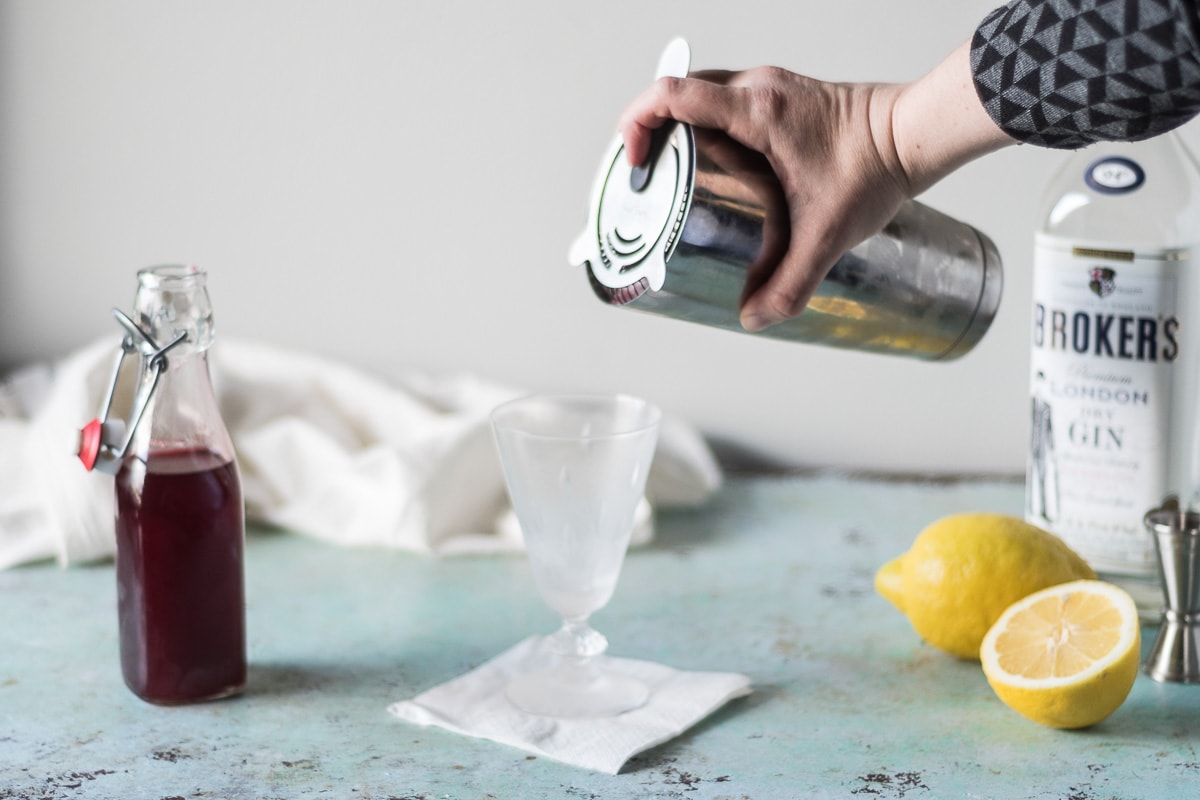 The Clover Club, a cocktail with gin + lemon + raspberry Blossom to Stem