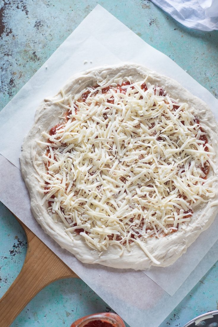 The best pizza dough, chewy thin crust with a puffy rim Blossom to Stem