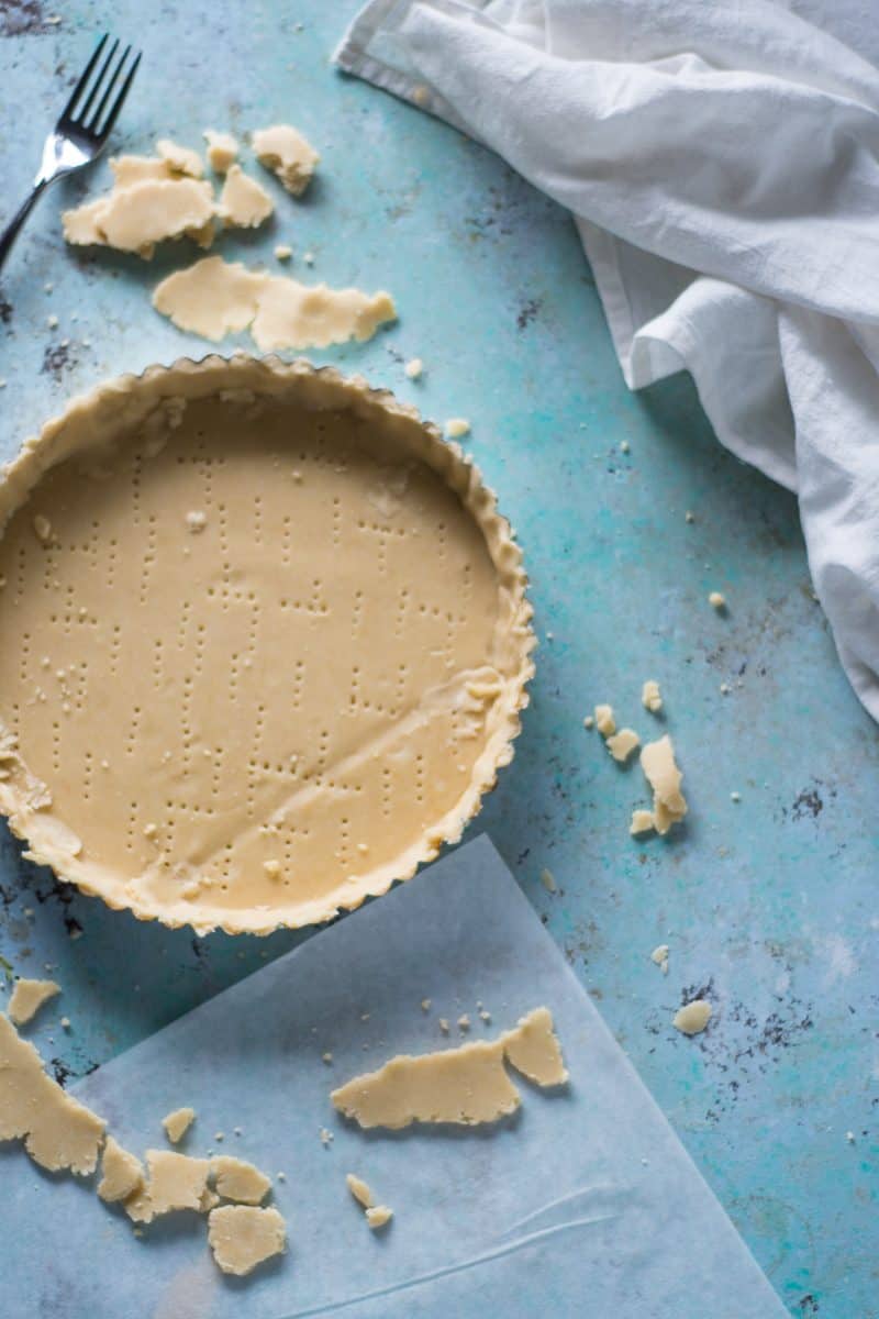 Unbaked tart crust getting trimmed