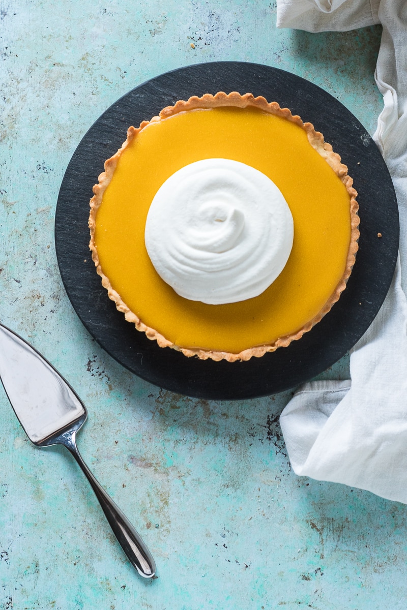 Passion Fruit Tart. A sweet and puckery passion fruit curd baked in a crisp tart shell. Like a lemon tart (or tarte au citron) but better.