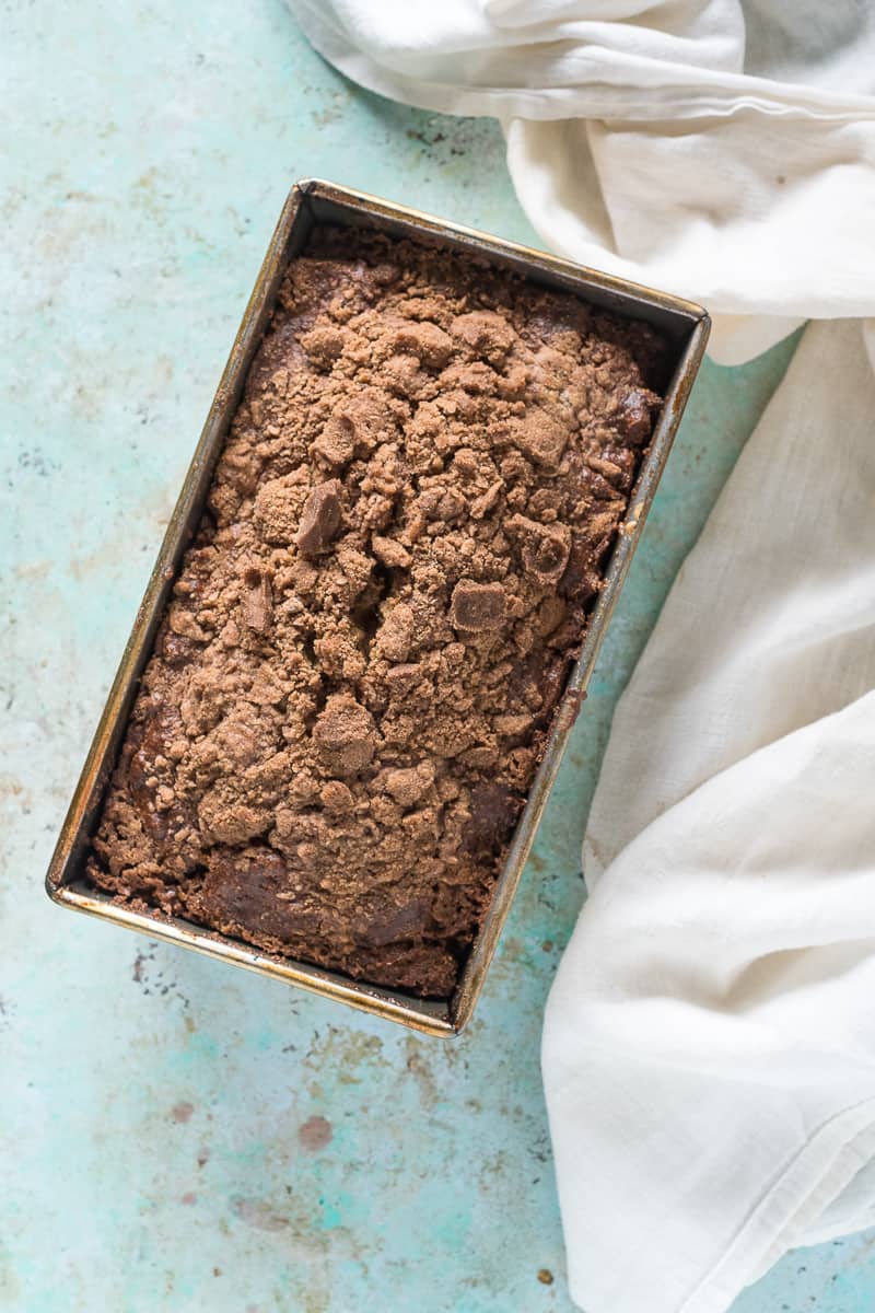 Streusel-topped Banana Bread with Chocolate and Pecans in a loaf Pan