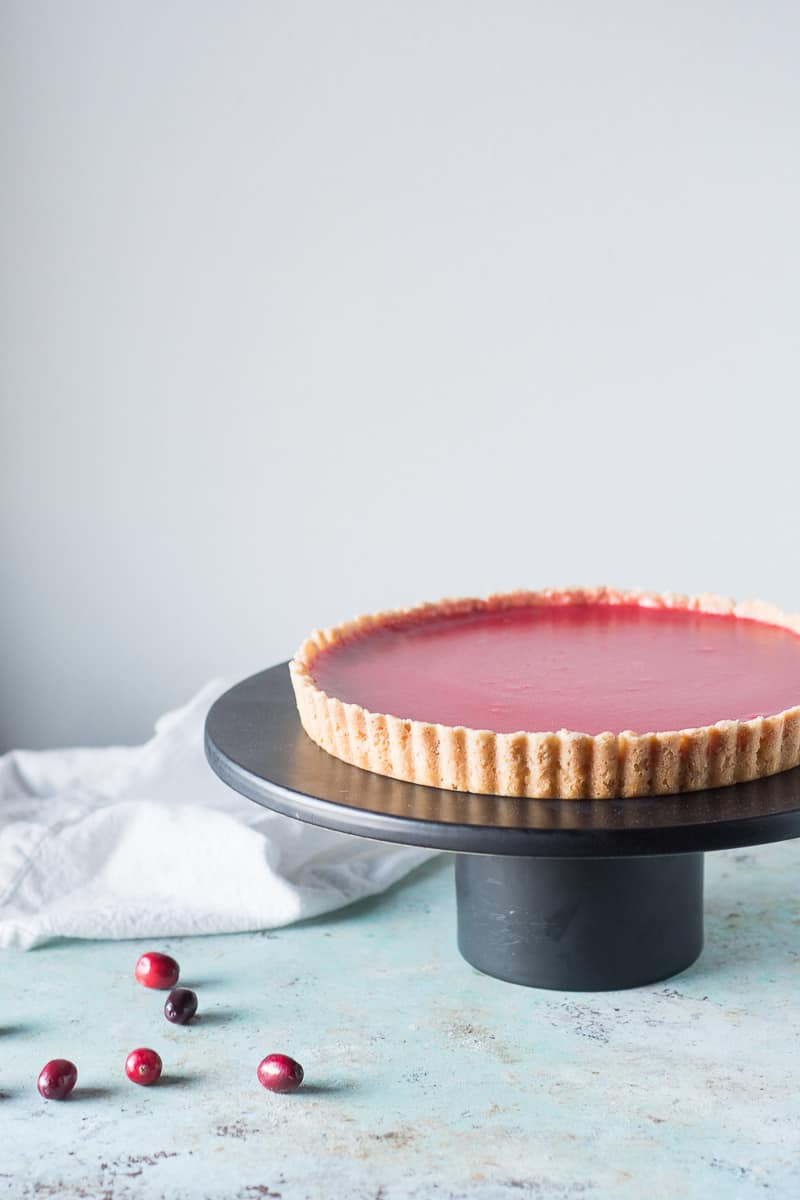 Cranberry Curd Tart on a cake stand