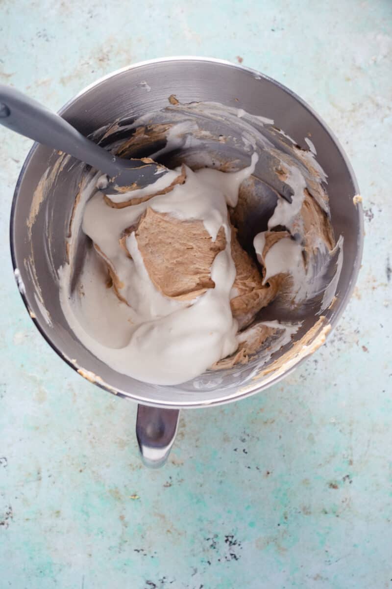Peanut butter mousse mixture in a mixing bowl