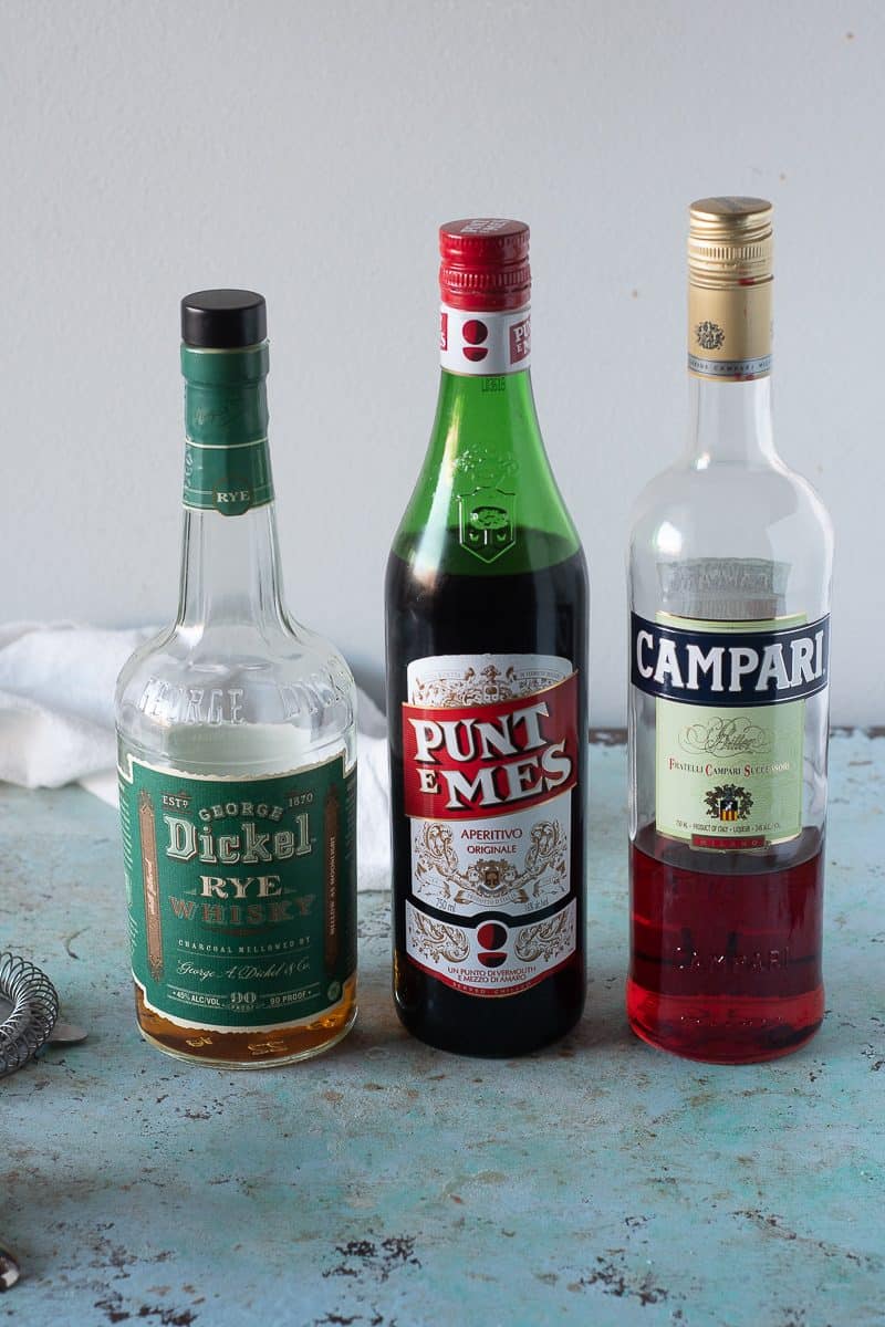 Bottles of Dickel Rye, Punt e Mes, and Campari