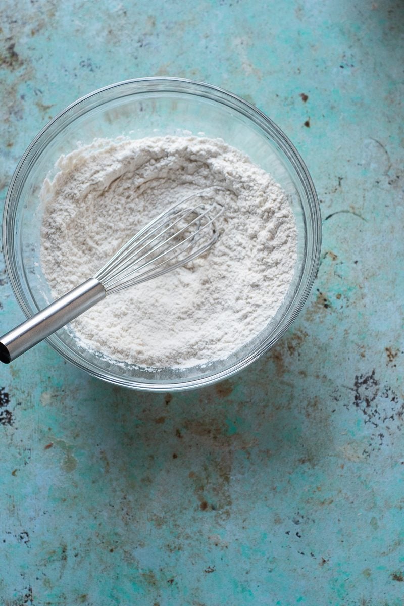 Dry ingredients in a bowl with a whisk