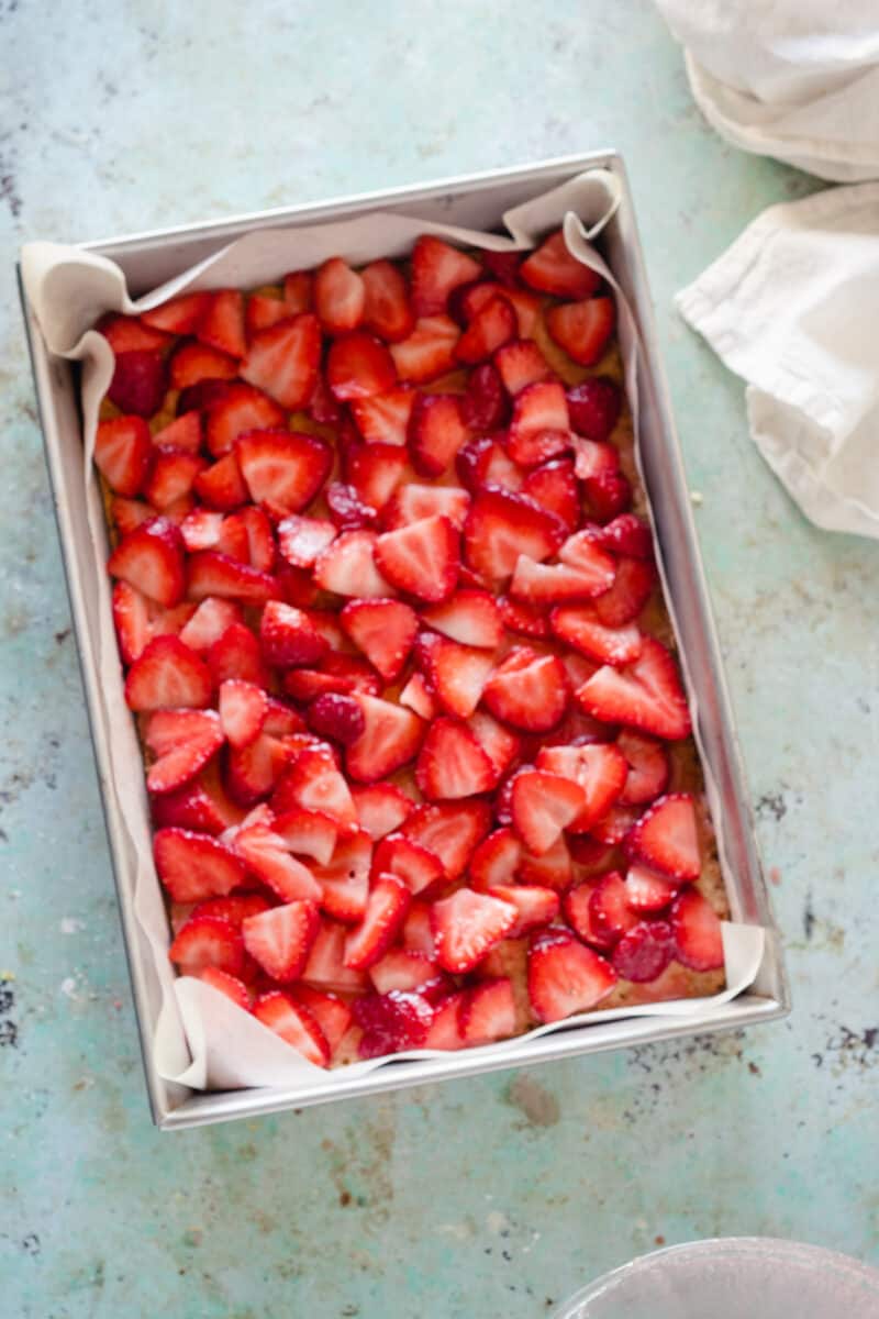 Strawberries spread over the crumb crust