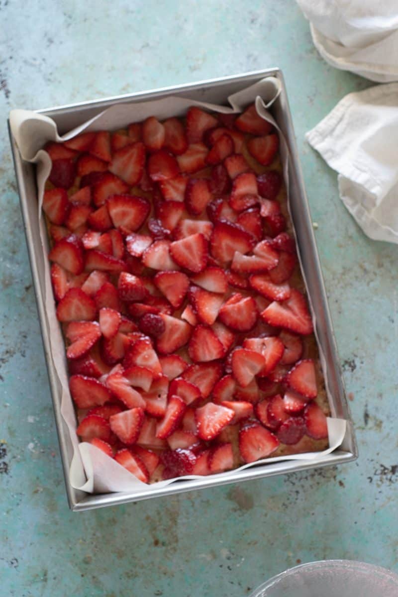 Strawberries spread over crust