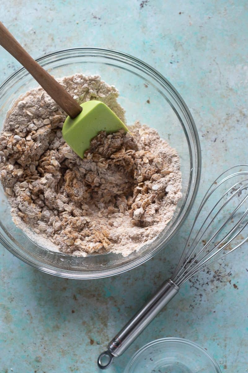 A mixture of oat flour, oats, cinnamon, cardamom, coriander, and an egg