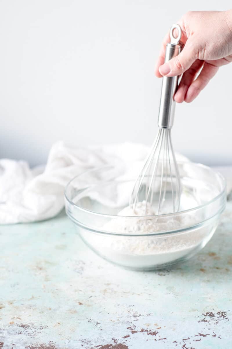 Hand whisking flour mixture