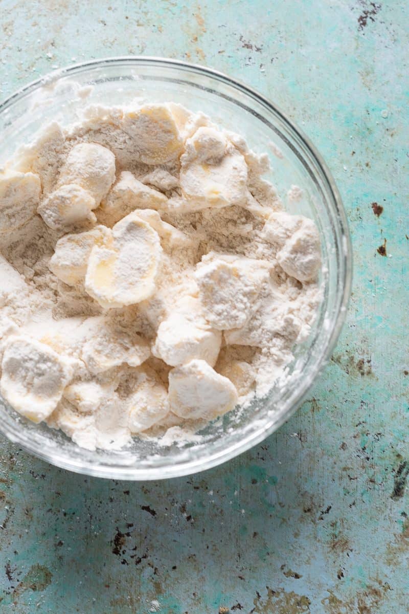 Butter pieces smashed in flour mixture