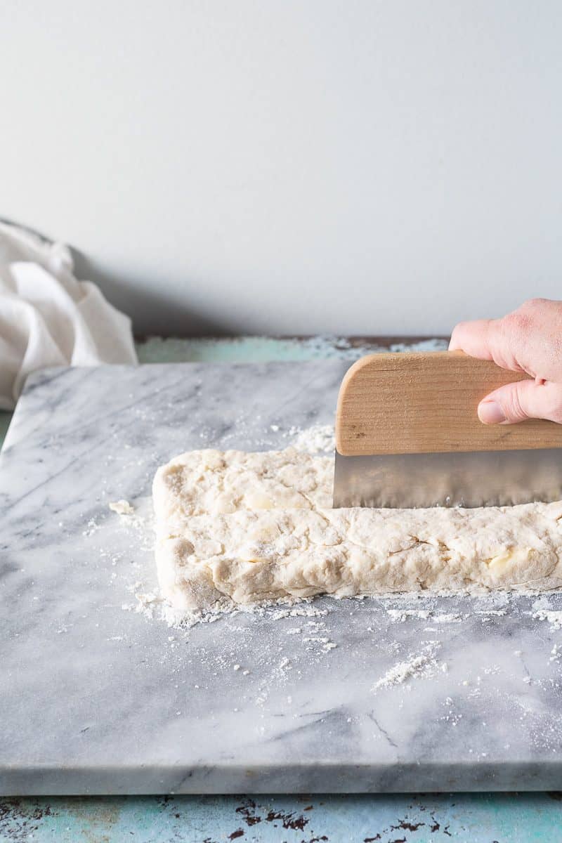 Biscuit dough being cut