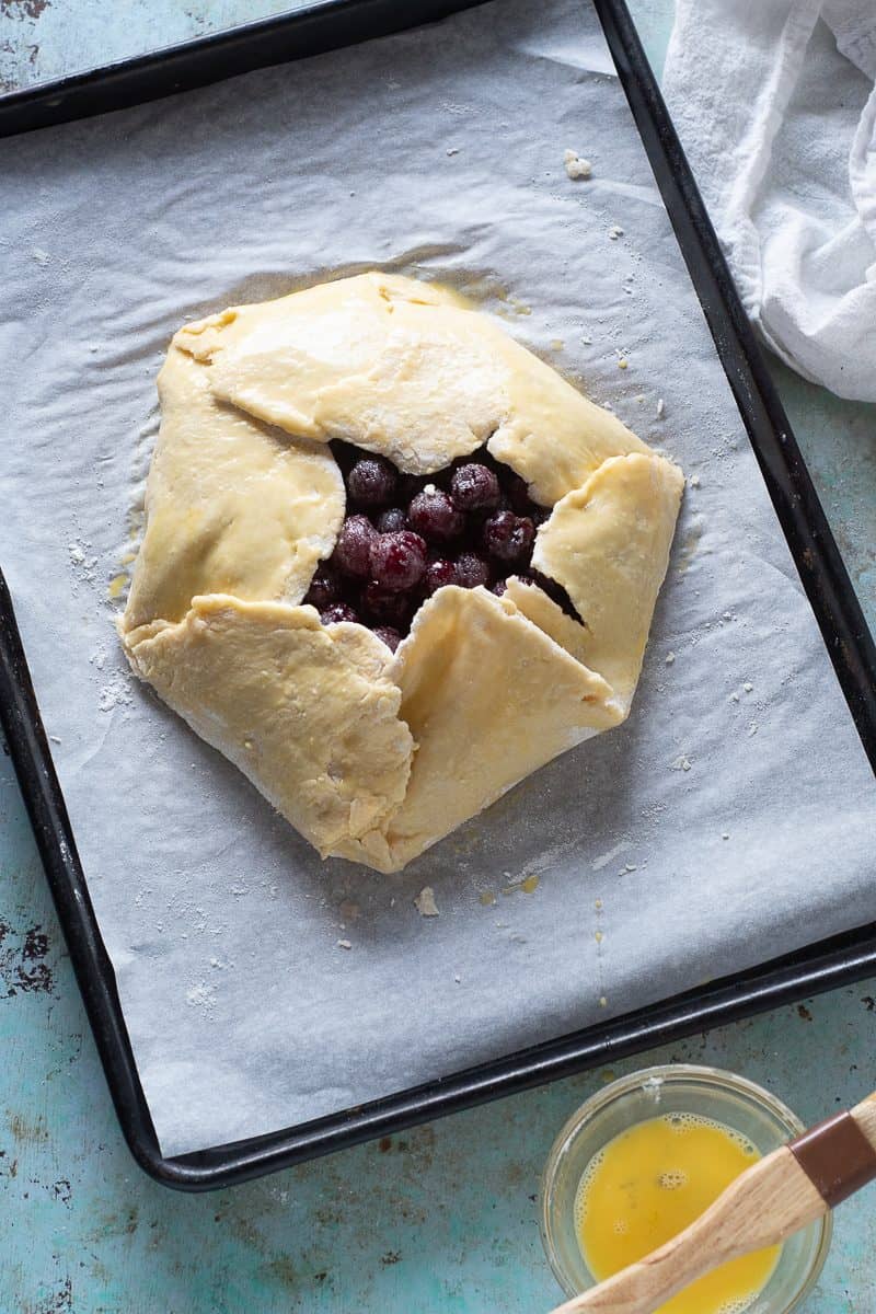 Unbaked galette brushed with egg wash