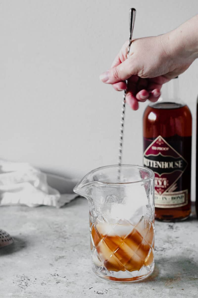 Stirring a Manhattan in a mixing glass