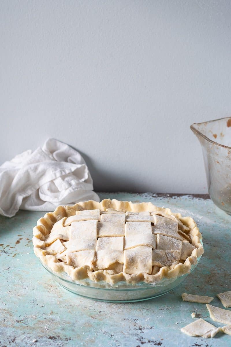 Completed lattice-top pie ready to be brushed with pie wash and baked