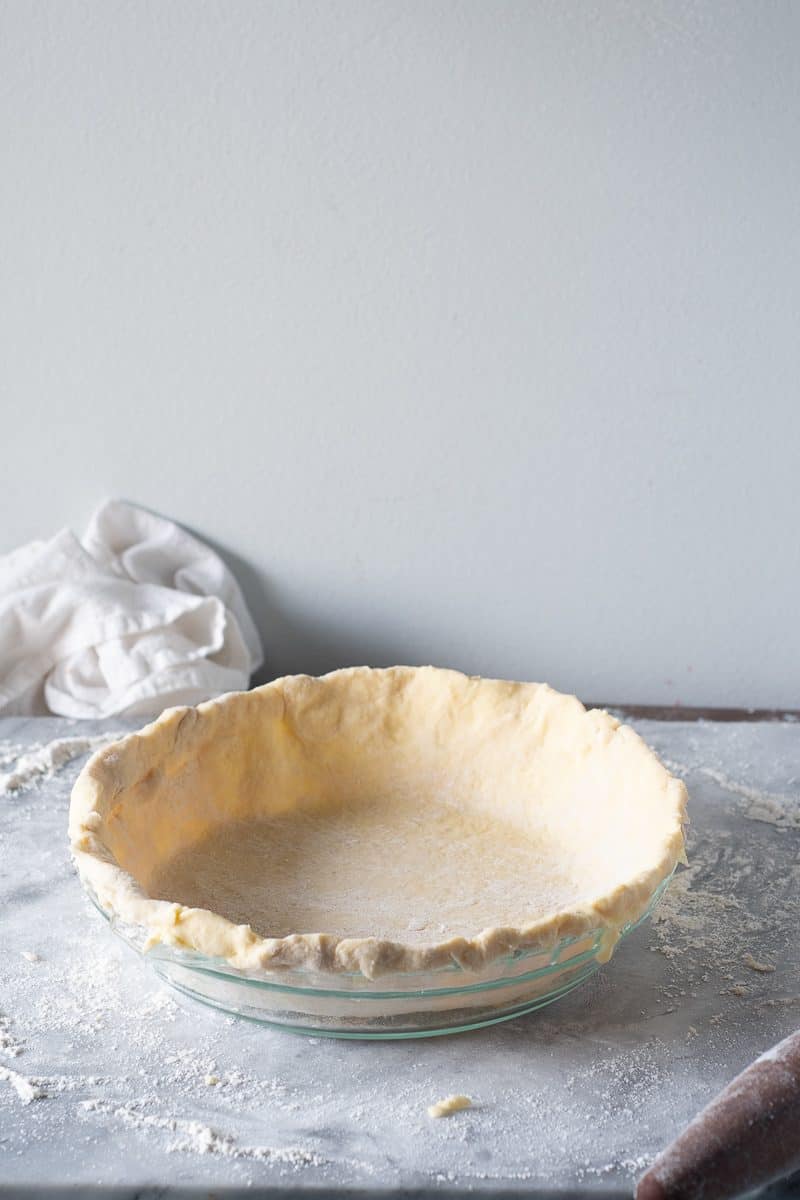 Unbaked pie crust in a pie plate